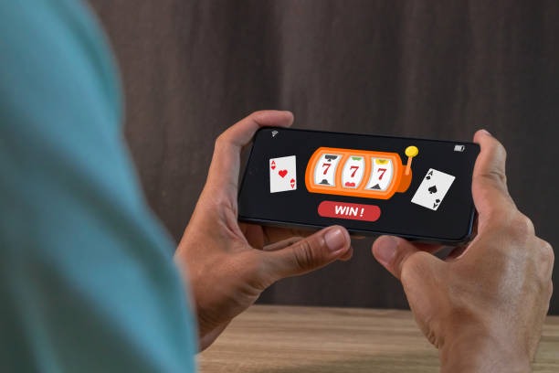 taipan77 app dashboard showing Treasures of Aztec slot game alongside live-dealer lobby icons for blackjack, roulette, and baccarat tables